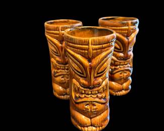 Set of three glazed "Tiki Farm" ceramic tiki mugs.