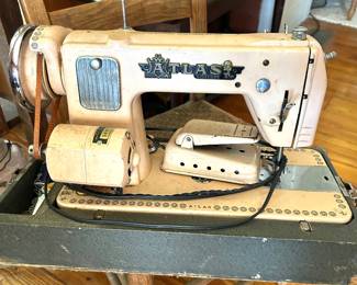antique Atlas sewing machine with cover case