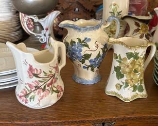 Cash family pottery creamers