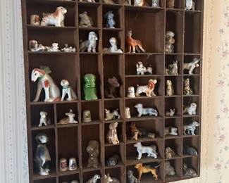assorted dog and animal figurines with display tray 