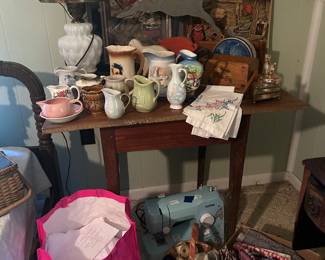 primitive table , lot of 100 pillow cases for wedding chair covers. 
