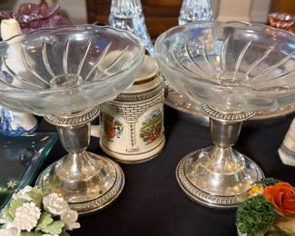 Pair of weighted sterling silver and glass candle sticks
