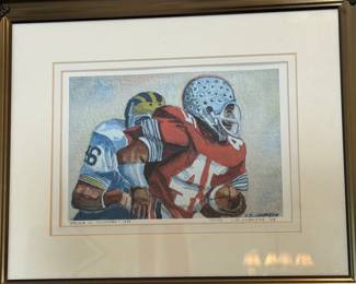 Framed ‘Archie vs. Michigan’ football art print, numbered 14/105 and signed C. D. Johnson ’08.