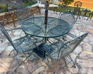 Green patio table and 4 chairs