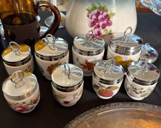 Porcelain egg coddlers with metal lids in assorted decorative patterns