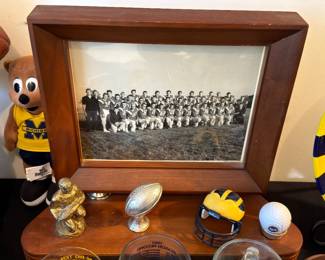     Framed black-and-white football team photograph