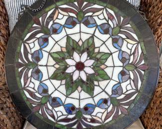 Large stained glass disk.