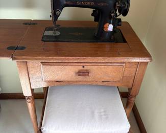 Antique black singer sewing machine