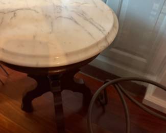 #26 - $68 - Round marble top table with wood legs 13x18t