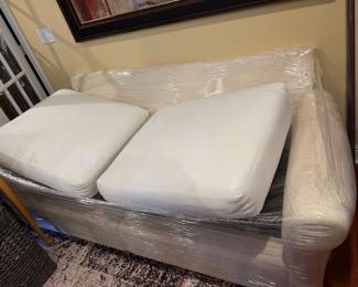 #52 - $280 - Cindy Crawford home furniture white sleeper sofa 83wx14dx32t