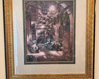 #65 - $90 - B. Brown gold scroll & black framed art of garden terrace 33wx38t