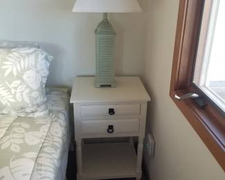 Nightstand; table lamp