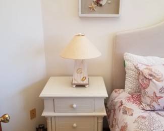 Nightstand; table lamp