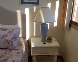 Nightstand; table lamp