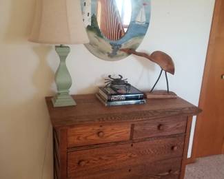 4-drawer dresser; table lamp; lighthouse mirror; shore decor