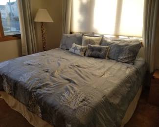 King bed; floor lamp