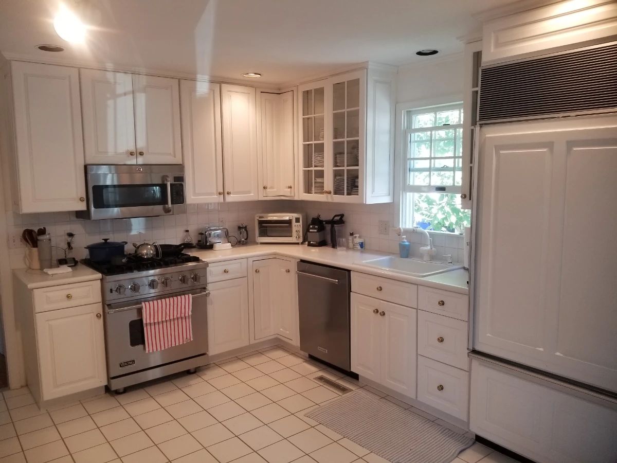 L-shaped kitchen with ample cabinetry