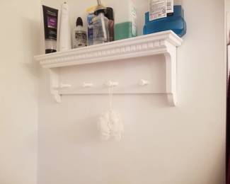 Shelf with pegs