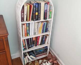 Wicker bookcase; books
