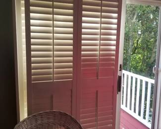 Plantation shutters for sliding glass doors