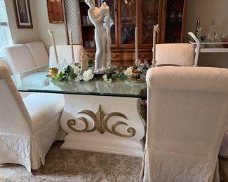 Glass table with six chairs
