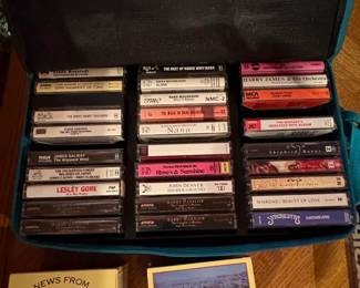 Assorted Vintage Cassette Tapes and VHS Home Video Collection