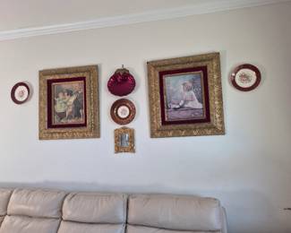 Antique prints in gold, red velvet antique frames