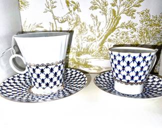 Imperial porcelain St. Petersburg Lomonosov cobalt net patterned cup, and saucer set.