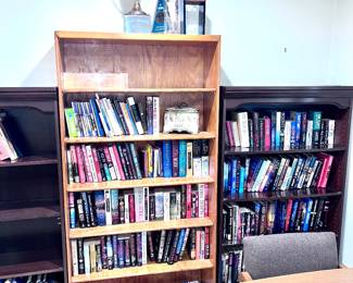 Five bookshelves full of books