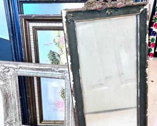 Various unique mirrors and framed artwork