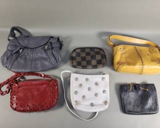 621 Lot 546 Group of women s designer style handbags