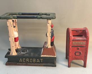 061 Lot 74 Pair of cast iron coin banks