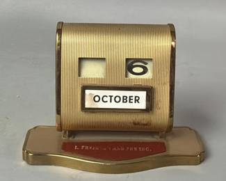 222 Lot 235 Vintage mechanical perpetual desk calendar