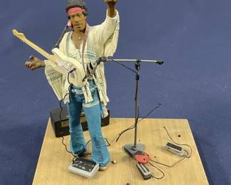 306 Lot 328h Jimi Hendrix plastic display piece with stage