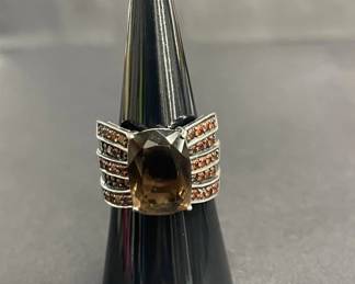 124 Lot 515h Sterling silver ring with smoky quartz and garnet