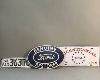 386 Lot 370 Pair of vintage license plates with metal