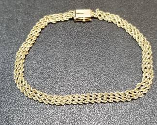 052 Lot 165 14k yellow gold triple rope chain bracelet Needs