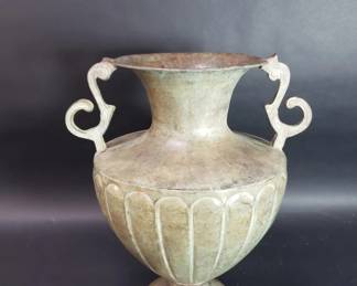 655 Lot 578 Brass verdigris vase with scroll handles