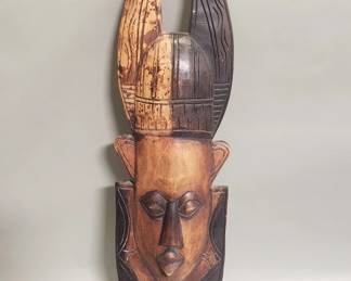 210 Lot 223 Carved wood tribal style wall mask
