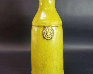 649 Lot 573 Glazed green pottery vase