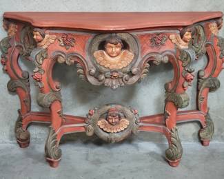139 Lot 152 Baroque style carved wood console table with
