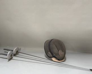040 Lot 53 Pair of fencing swords with mask