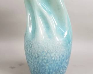 225 Lot 238 Glazed ceramic vase with a twisted fluted neck
