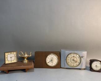 452 Lot 405 Four electrical alarm clocks