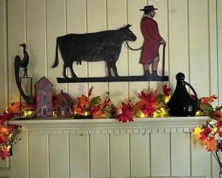 Various rooster items and metal wall decor