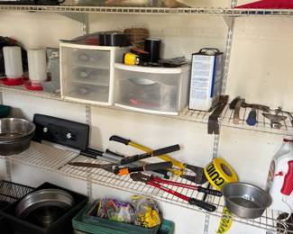 Various garden tools and pet supplies