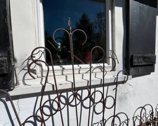 Bird and heart wrought iron fencing