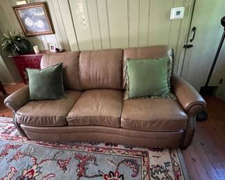 curved front leather couch