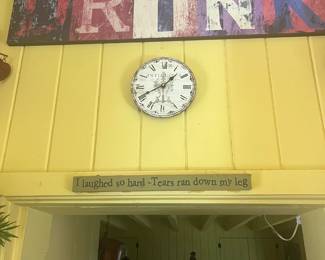 Drink signs and various clocks