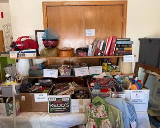 books, VHS, CDs, DVDs, kids clothing, household chemicals, Dirt Devil, baskets